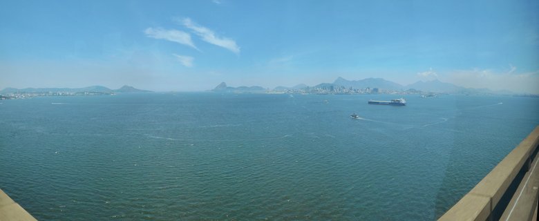 Aerial view of Guanabara Bay with Sugarloaf Mountain and cargo ships, Rio de Janeiro, Brazil
