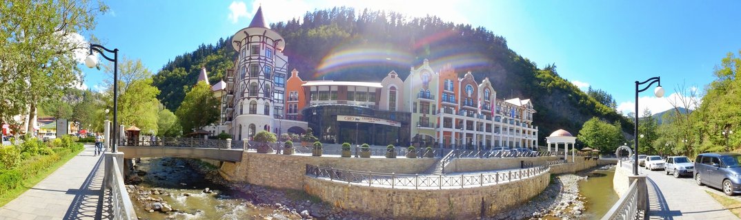 Colorful European-style buildings along river in Borjomi resort town, Georgia