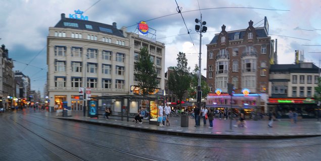Evening street scene at Leidseplein square with KLM building and Hard Rock Cafe, Amsterdam, Netherlands