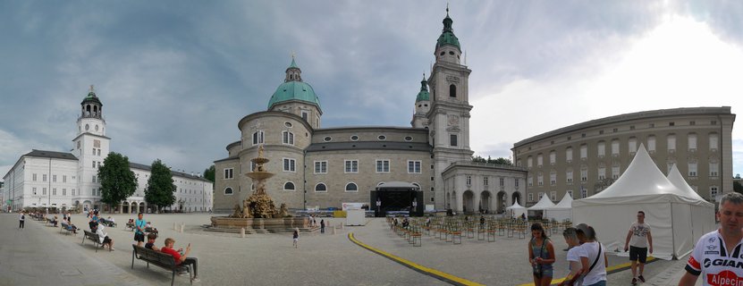 Salzburg Cathedral and Residenzplatz with tourists in historic city center, Austria