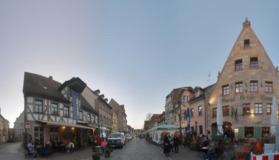 Historic Old Town Street Scene in Fürth, Germany with Traditional Half-Timbered Buildings and Outdoor Dining